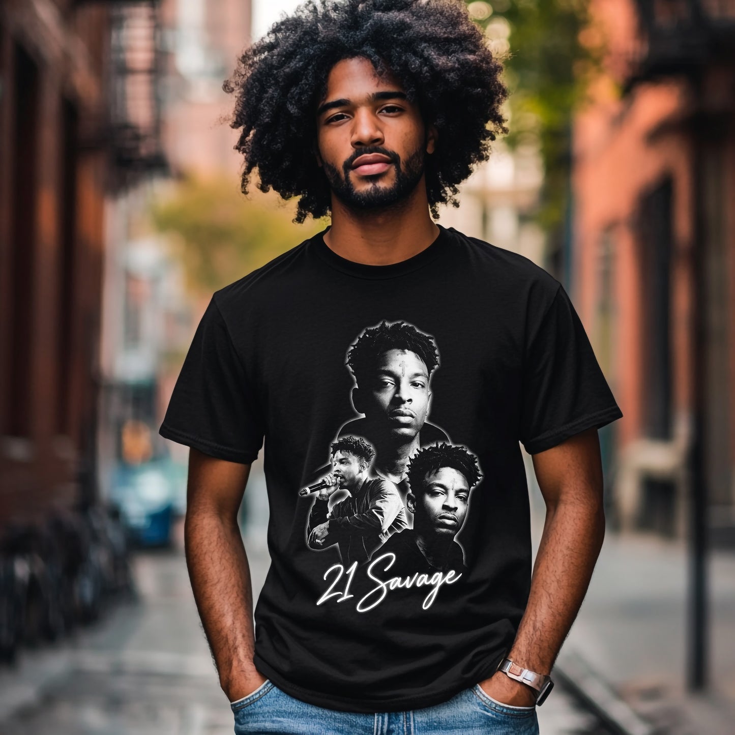 Man wearing a black t-shirt with '21 Savage' graphic on a city street