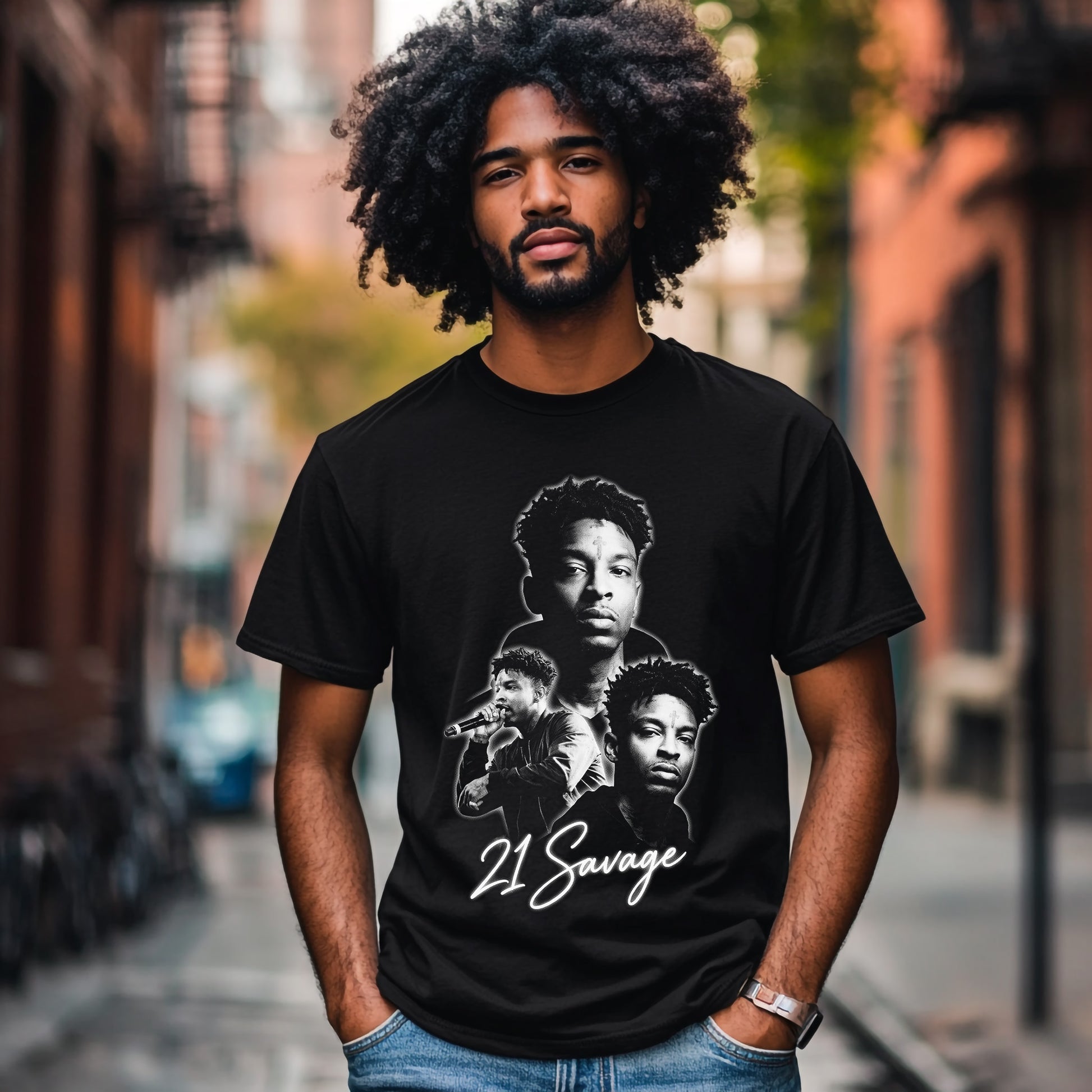 Man wearing a black t-shirt with '21 Savage' graphic on a city street