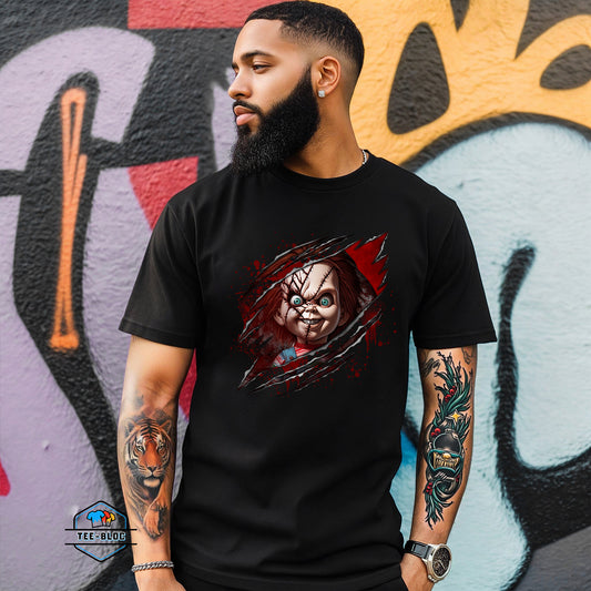 Man wearing a black t-shirt with a graphic design of Chucky in front of a graffiti wall.