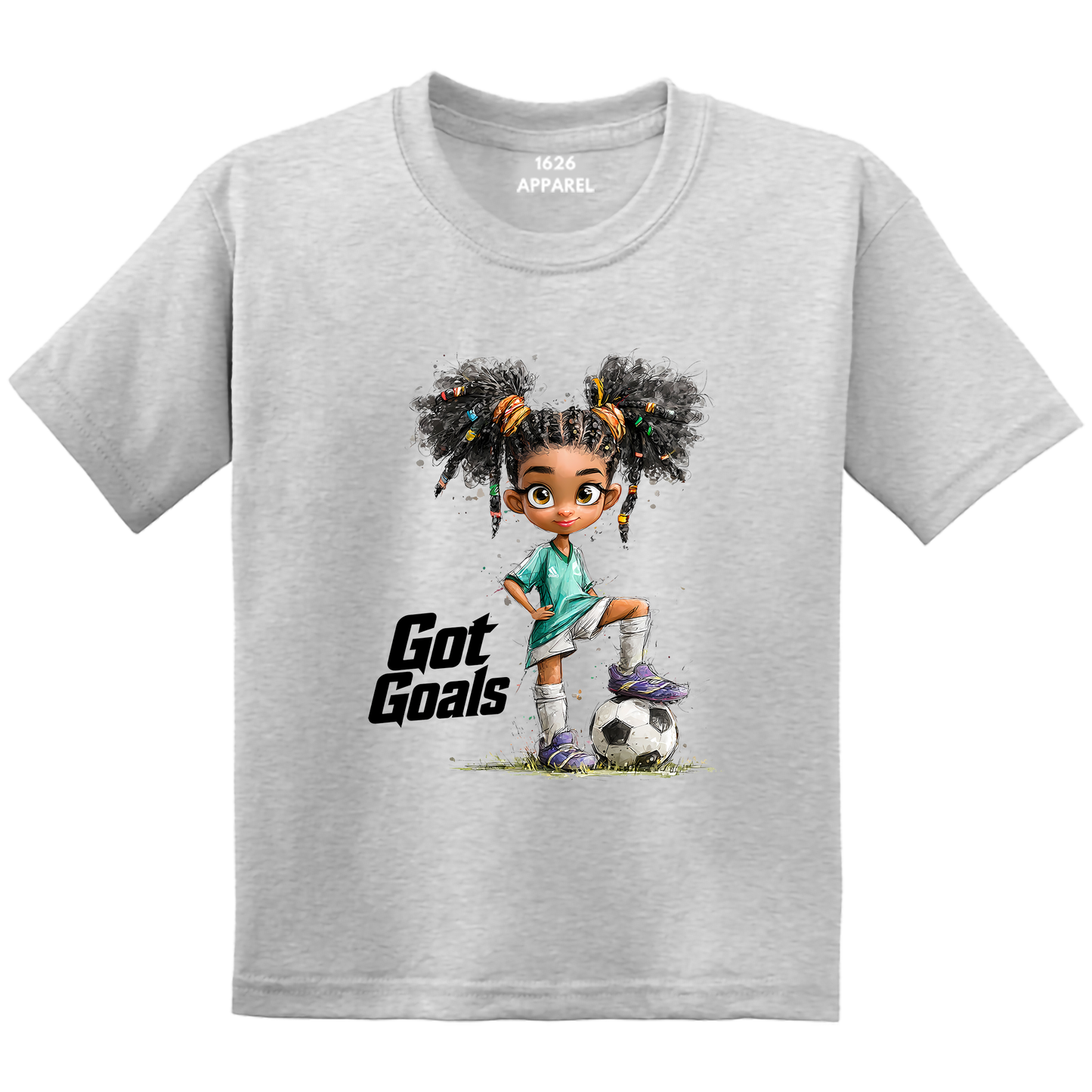 A light heather gray short-sleeve t-shirt with a cartoon graphic of a girl with pigtails wearing a teal soccer uniform and kicking a soccer ball, next to the text 'Got Goals'. The brand '1626 APPAREL' is printed inside the collar.