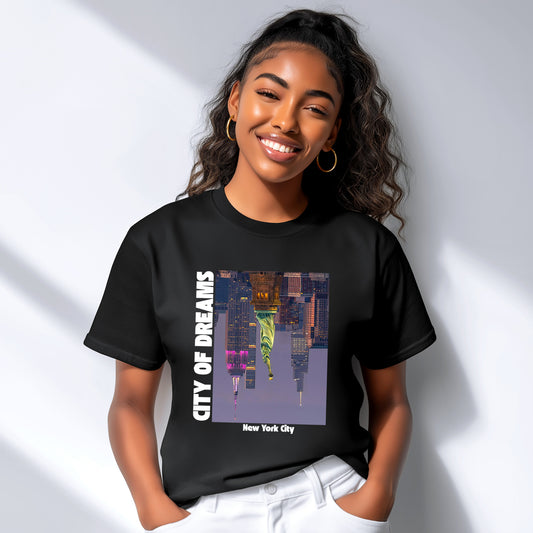Person wearing a black t-shirt with 'City of Dreams New York City' design on a white background